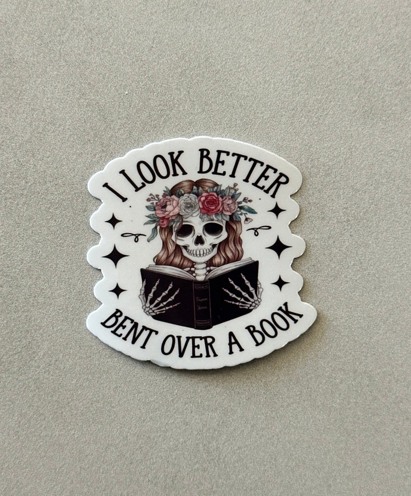 I Look Better Bent Over A Book - Sticker